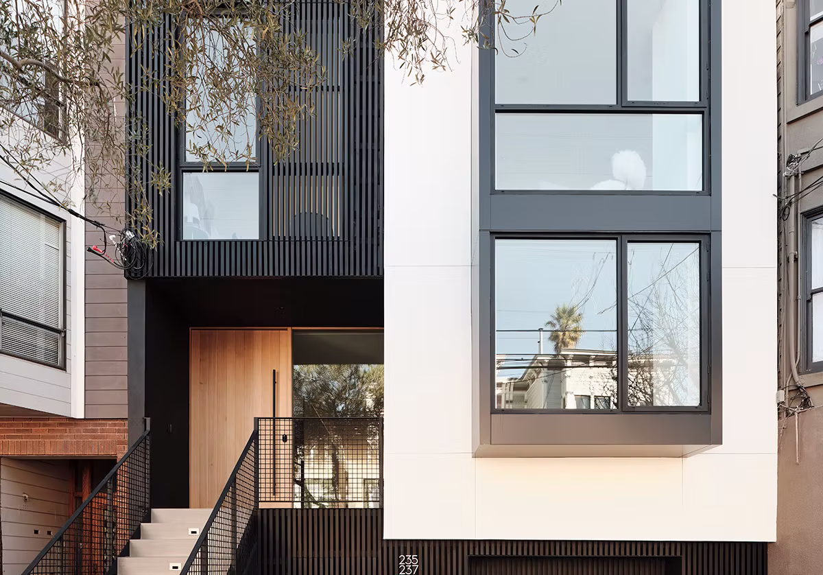 Modern residential facade with timber and steel detailing